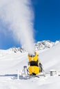 Snow gun in the mountains Royalty Free Stock Photo