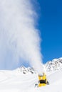 Snow gun in the mountains Royalty Free Stock Photo