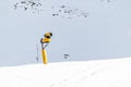 Snow guns in a winter mountain resort, preparin ski way