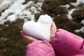 Snow heart in hands Royalty Free Stock Photo