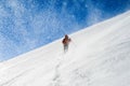 Snow hiker walking on snow during a snowstorm,s elective focus