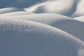 Snow hills in sunny weather