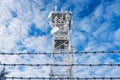 Frozen telecommunication mast with antennas high in the mountains Royalty Free Stock Photo