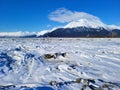 Snow covered mudflats, Turnagain Arm, outside of Girdwood, Alaska on a clear winter day.