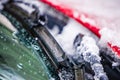 Snow and ice covered windshield wipers