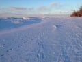 Snow and Ice Dunes on Shore of Lake Erie at Sunset, Presque Isle State park Royalty Free Stock Photo