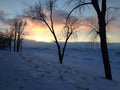 Snow and Ice Dunes on Shore of Lake Erie at Sunset, Presque Isle State park Royalty Free Stock Photo