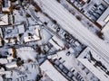 Aerial view of snow compromised rail and road networks.