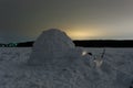 Snow igloo on the frozen sea at night Royalty Free Stock Photo