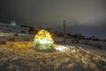 Snow igloo at night in the mountains Royalty Free Stock Photo