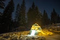 Snow igloo at night in the mountains Royalty Free Stock Photo