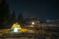 Snow igloo at night in the mountains Royalty Free Stock Photo