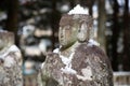 Snow on jizo little budha statues in Nagano