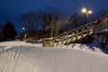 Snow landscape in Burgas Sea Garden, near the Culture center Sea Casino at blue hour. Royalty Free Stock Photo