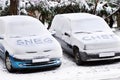 Snow letters written on cars Royalty Free Stock Photo