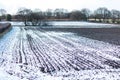 Snow on a Ploughed Field Royalty Free Stock Photo