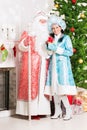 Snow maiden and santa claus Royalty Free Stock Photo