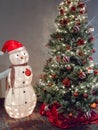 Snow man and Christmas tree Royalty Free Stock Photo
