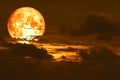 snow moon back on silhouette heap cloud on sunset sky Royalty Free Stock Photo