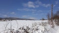 Snow mountain on blue sunny sky