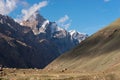 Snow mountain peak covered by clouds in Zanskar valley, Himalaya mountains range in Ladakh region, northern India Royalty Free Stock Photo