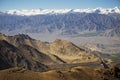 Snow mountain range at road side viewpoint on the way to Khardung La from Leh LADAKH, INDIA Royalty Free Stock Photo