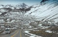 Snow mountain road on the border of Argentina and Royalty Free Stock Photo