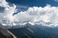 The snow mountains and clouds in Aba prefecture of Sichuan province, China. Royalty Free Stock Photo