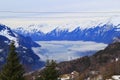 Snow mountains. low clouds