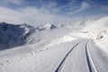 Snow mountains with road Royalty Free Stock Photo