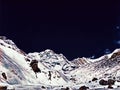 Snow mountains under black sky. Digital illustration of Himalaya mountains ice peaks panoramic view.