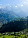 Snow mountains and village at Brahmaputra River