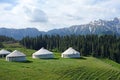Snow mountains with yurts