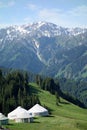 Snow mountains with yurts