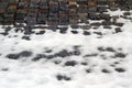 Snow on old stone pavement Royalty Free Stock Photo