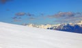 snow and the panorama of the European Alps mountain range in winter with snow-capped peaks without people Royalty Free Stock Photo