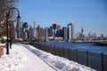 The snow path of the Hudson river walkaway with downtown Manhattan on the back