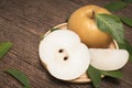 Snow pear or Korean pear on a wooden background, Nashi pear fruits delicious and sweet on wooden background Royalty Free Stock Photo