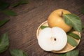 Snow pear or Korean pear on a wooden background, Nashi pear fruits delicious and sweet on wooden background Royalty Free Stock Photo