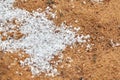 Snow pellets, graupel or soft hail on the ground. Form of precipitation Royalty Free Stock Photo