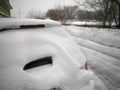 Snow pile on the car top Royalty Free Stock Photo