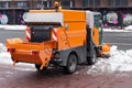 Snow plough cleaning pavements and streets which are covered in snow and mud during heavy snowfallÃÅ½