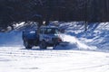 Snow Plow Clearing Skating Rink