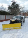 Snow plow truck in Brooklyn, NY ready to clean streets after massive Winter Storm Helen strikes Northeast Royalty Free Stock Photo