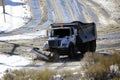 Snow Plow Truck on Wintry Snowy Road Clearing Driving Path