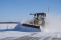 Snow plower on rural road