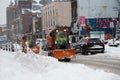 Snow Plows clearing street down town toronto