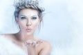 Snow queen blowing in her hand Royalty Free Stock Photo