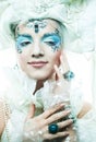 Snow Queen, creative closeup portrait. Young woman in creative image with silver artistic make-up Royalty Free Stock Photo