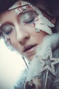 Beautiful young woman with bright creative make-up in New Year& x27;s costume posing with her eyes closed Royalty Free Stock Photo